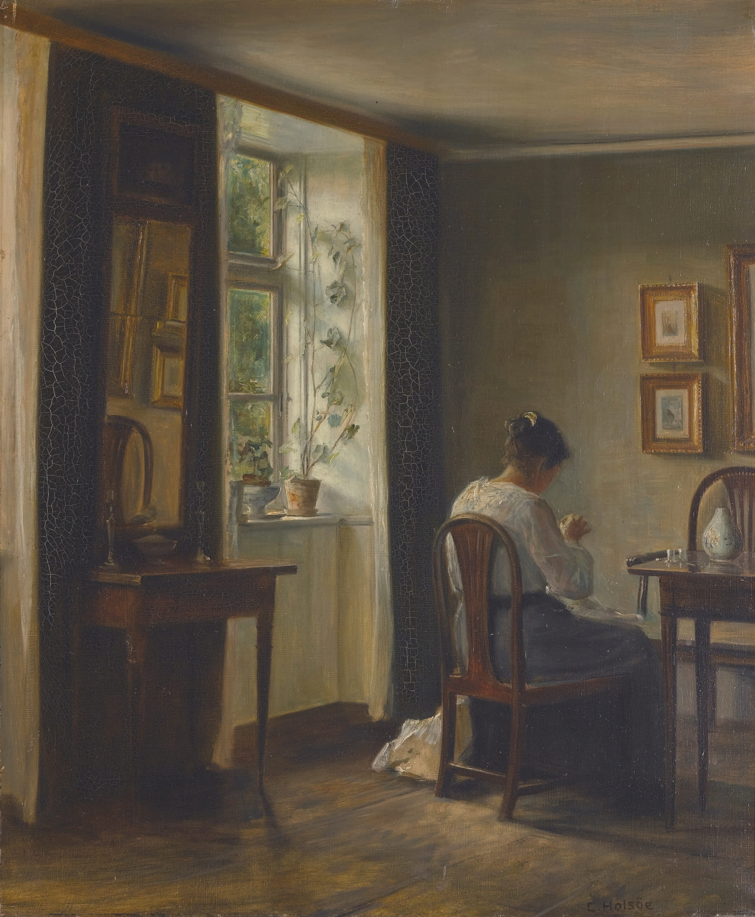 Seamstress Sewing In An Interior by Carl Holsøe (Danish, 1863-1935)